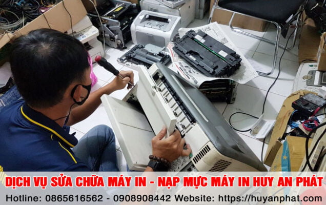 Đổ Mực máy in canon 7018C